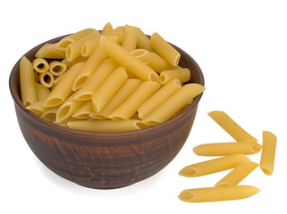 Italy dry raw pasta penne rigate in the bowl. Closeup on a white background