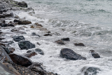 Georgia, Ajaria, green cape. waves at sea on a cloudy day.