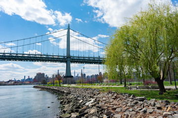 East River along Randalls and Wards Islands of New York City during Spring with the Triborough Bridge