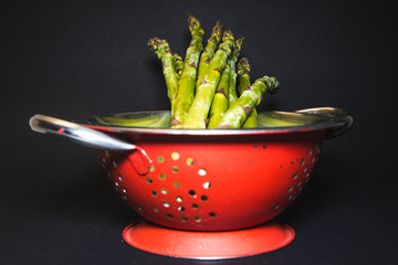 raw green asparagus on background