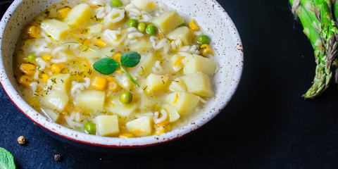 soup vegetables and pasta alphabet, peas, corn Menu concept healthy eating. food background top view copy space for text healthy eating table setting keto or paleo diet organic 