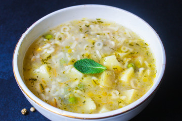soup vegetables and pasta alphabet, peas, corn Menu concept healthy eating. food background top...