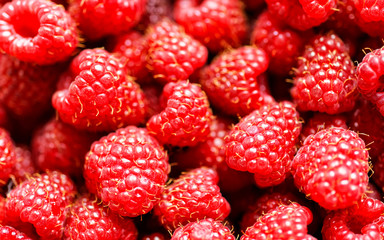 Fresh raspberries background close up reflex