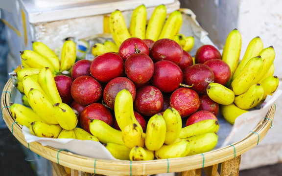 Asian Street Farmer Market Selling Fresh Banana And Passion Fruit Reflex