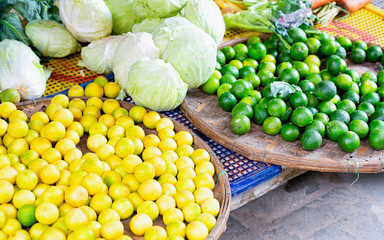 Asian fruit assortment such as limons and lime Hoi An reflex