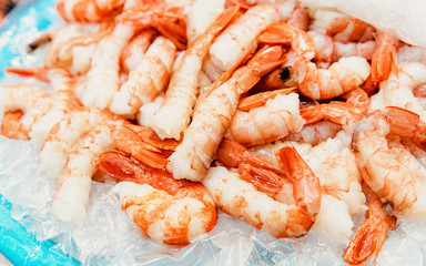 Sale of Fresh shrimps in fish market in Busan reflex