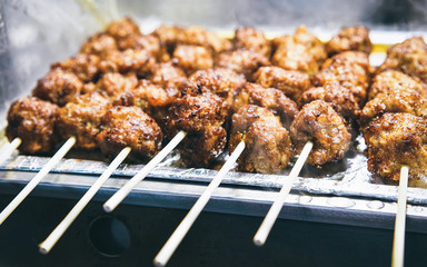 Meat balls at Myeongdong open street market in Seoul reflex