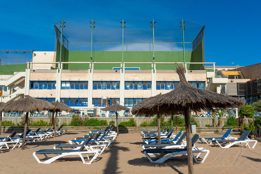 View Of Touristic Beach Empty With No People, Due To The Lock Down Imposed Against Coronavirus, Which Has Caused A Major Crisis In The Tourism And Travel Sectors