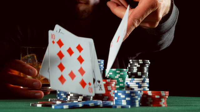 Poker player throwing cards