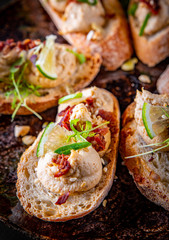 Fresh bruschettas with pate in plate