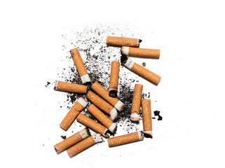 Cigarette butts stuck in ash  isolated against white background. smoking reduction campaign in World No Tobacco Day.