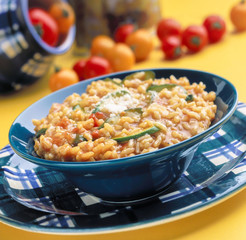 Tomato & Courgette Risoto in blue bowl