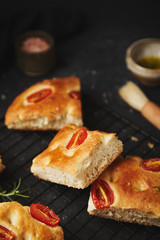 Italian pastries with cherry tomatoes and spicy herbs  -focaccia