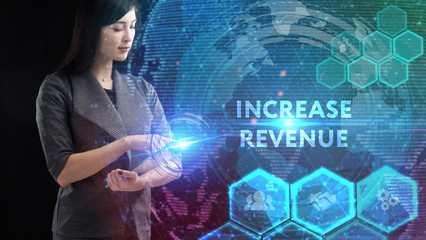 Business, Technology, Internet and network concept. Young businessman working on a virtual screen of the future and sees the inscription: Increase revenue