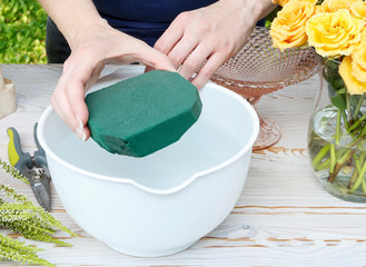 How to make modern table's centerpiece for summer wedding. A lot of greenery being composed into...