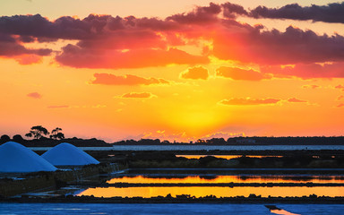 Sunset at salt evaporation pond at Marsala Sicily reflex