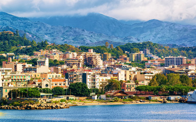 Cityscape of Messina and  Mediterranean Sea at Sicily island reflex