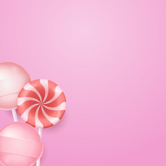 Pink background with yummy lollipops and candies. Candy background.