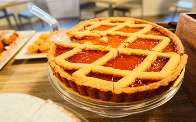 Sweet Apple pie pastry with jam in cafe reflex