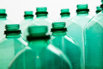 Close up of green plastic water bottles. Household recycling