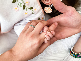 mother and baby hands