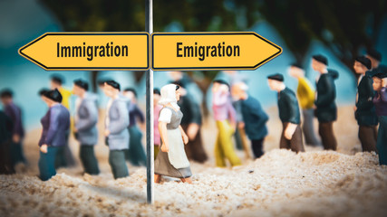 Street Sign Emigration versus Immigration