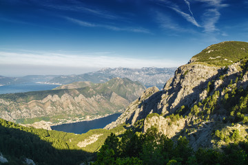Sunrise panoramic morning view of mountain randge and Kotor bay, Montenegro. View from the top of the mountain serpentine.
