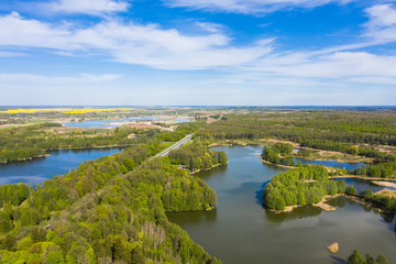 Obraz premium Aerial view of the highway through the forest