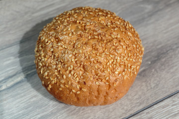 Hamburger bun with sesame seeds.