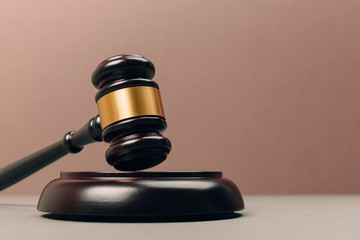 Symbol of law and justice on wooden table in lawyer office