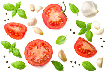 tomato slices with garlic and basil isolated on white background, top view - obrazy, fototapety, plakaty