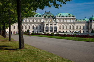 Naklejka premium The tree lined entrance to the Belvedere Palace in Vienna, Austria