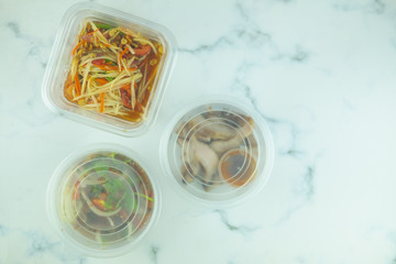 Somtum papaya salad spicy set Thai style, grill pork and grilled pork salad