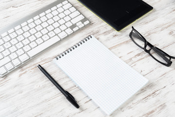 Still life of office workspace with supplies