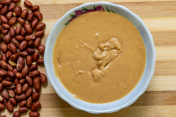 Pile of Peanuts on a Cutting Board