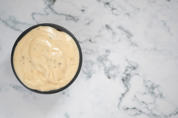 Bowl of cream dressing sauce