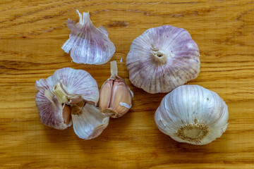 Whole and slices of garlic. Healthy vegetable