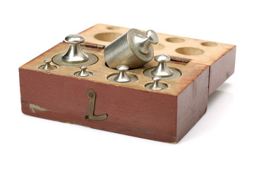 Set of a vintage weights for a old balance scale