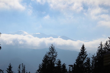 time lapse clouds over the mountains