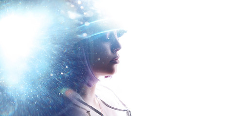 Beautiful woman with purple hair over white background. Girl in glasses of virtual reality. Augmented reality, game, future technology, AI concept. VR. Blue neon light. Double exposure portrait.
