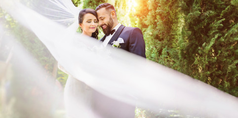 beautiful bride and groom in the nature