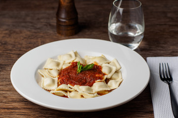 Italian ravioli with tomato sauce