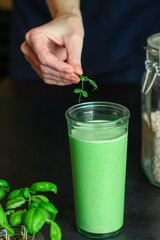 green smoothie detox cocktail antioxidant diet (organic fruit vitamins, vegetarian drink) menu concept background. top view. copy space