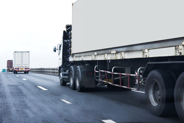 Naklejka na ściany i meble Truck on highway road with white container, transportation concept.,import,export logistic industrial Transporting Land transport on asphalt expressway