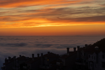 Sunset over the clouds in Laguna Beach California