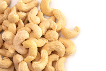 A Pile of Raw Natural Cashew Nuts Isolated on a White Background