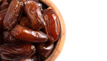 Bowl of Pitted Dates Isolated on a White Background