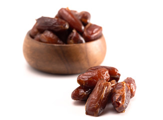 Bowl of Pitted Dates Isolated on a White Background