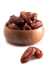 Bowl of Pitted Dates Isolated on a White Background