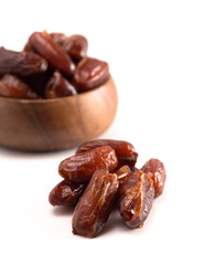 Bowl of Pitted Dates Isolated on a White Background